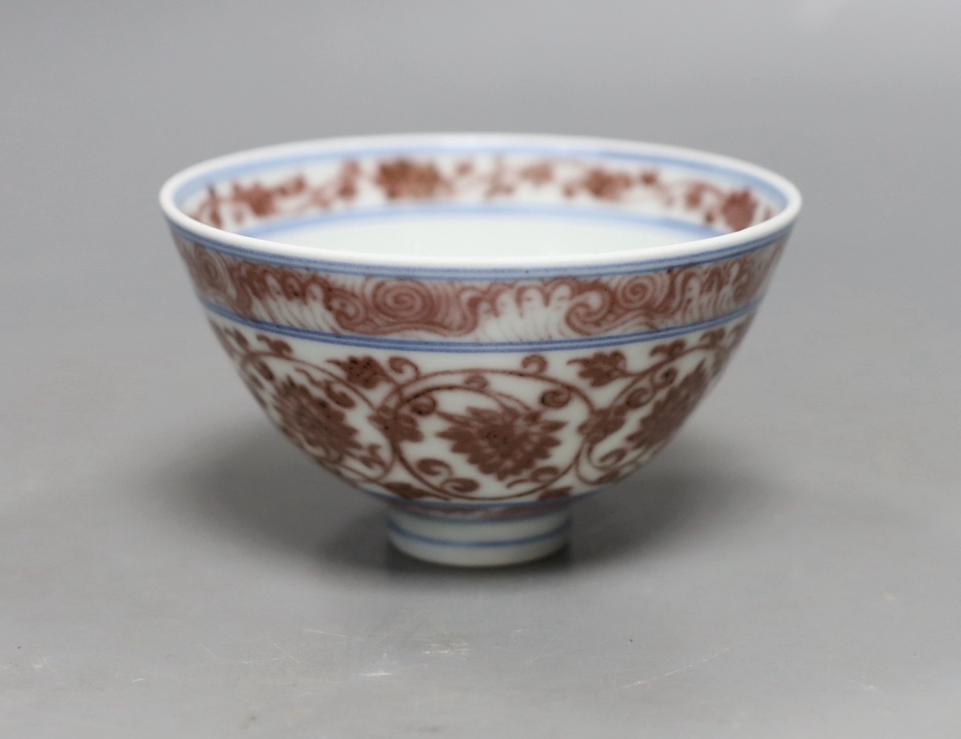 A small Chinese underglaze copper red bowl, 7.5cms high